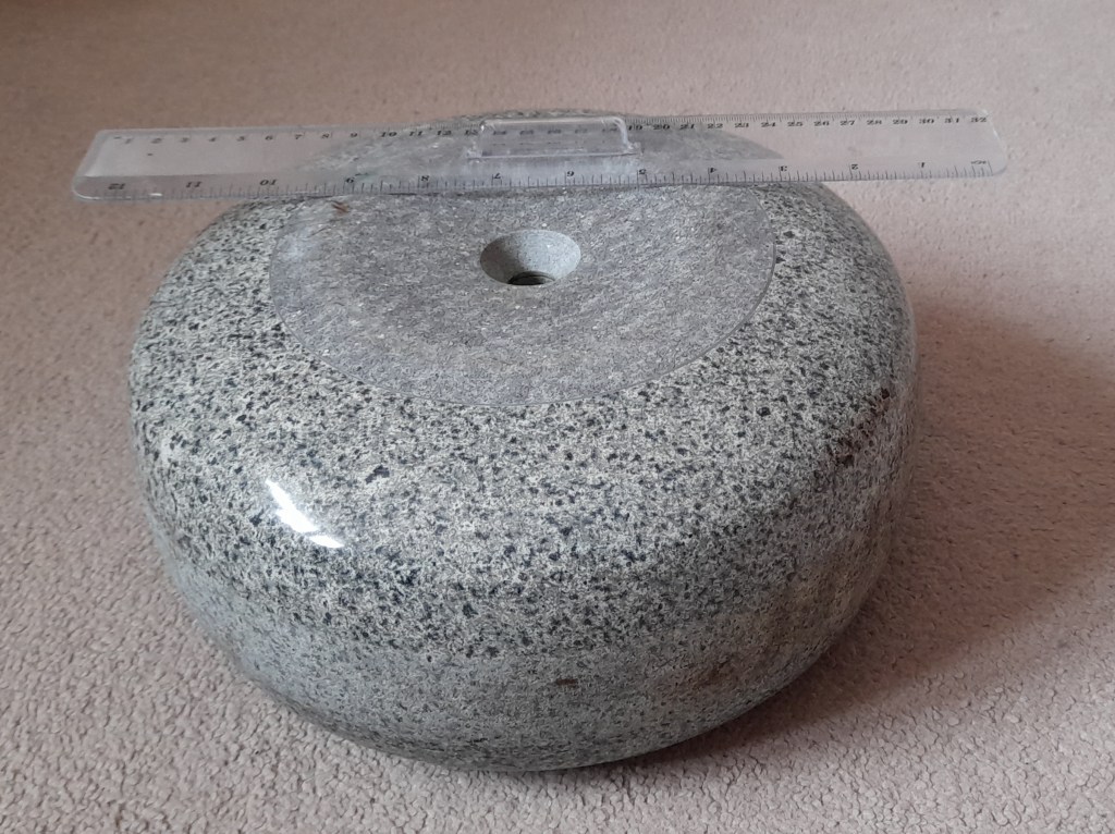 Photo of a curling stone.