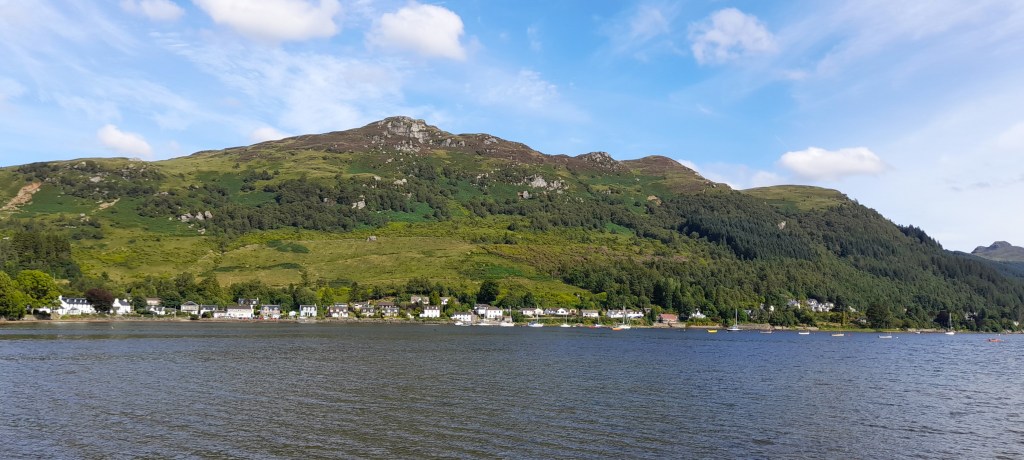 Photo of Lochgoilhead village across Loch Goil.